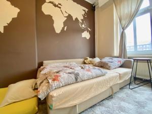 Posteľ alebo postele v izbe v ubytovaní Apartament w centrum Wrocławia w kamienicy