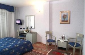 Kuchyň nebo kuchyňský kout v ubytování Hotel San Giorgio