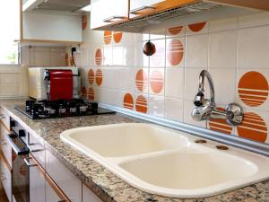 a kitchen counter with a sink in a kitchen at Apartment Riumar by Interhome in Segur de Calafell