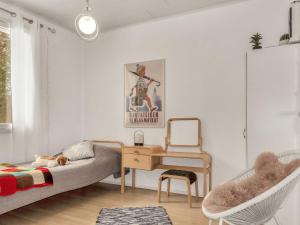 Postel nebo postele na pokoji v ubytování Holiday Home Huvikumpu by Interhome