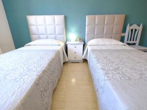 Postel nebo postele na pokoji v ubytování Apartment Eurosol-7 by Interhome