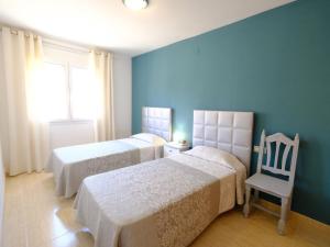 Postel nebo postele na pokoji v ubytování Apartment Eurosol-7 by Interhome