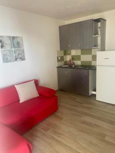 Kuchyň nebo kuchyňský kout v ubytování Villa Amari