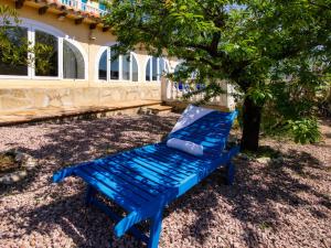 A garden outside Villa Villa Mandana by Interhome