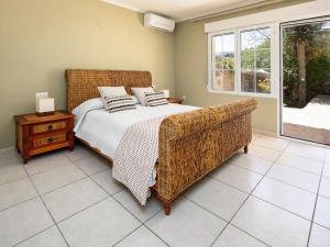 A bed or beds in a room at Villa Villa Mandana by Interhome