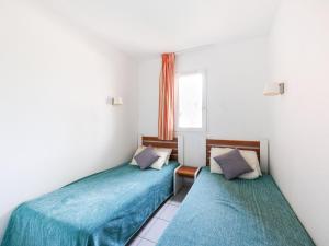 Posteľ alebo postele v izbe v ubytovaní Apartment Primavera-2 by Interhome