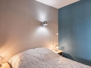 Posteľ alebo postele v izbe v ubytovaní Apartment Les Héliades-2 by Interhome