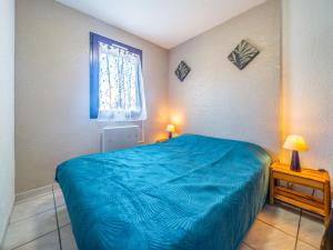 Posteľ alebo postele v izbe v ubytovaní Apartment Front de Mer-21 by Interhome