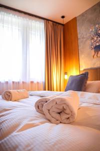 Кровать или кровати в номере Apartmany Furkotka - Ovruč