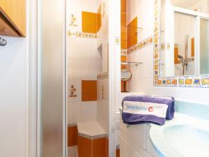 a bathroom with a shower and a sink at Studio Le Grand Foc-3 by Interhome in Cavalaire-sur-Mer