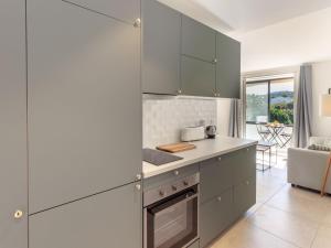 Η κουζίνα ή μικρή κουζίνα στο Studio Odyssee 80-2 by Interhome