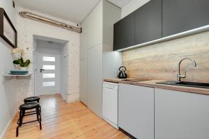 Kuchyň nebo kuchyňský kout v ubytování Hostel Vincent