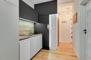 Kuchyň nebo kuchyňský kout v ubytování Hostel Vincent
