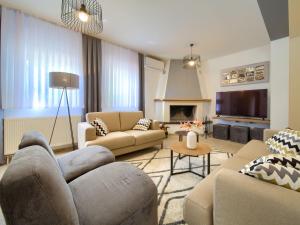 Posezení v ubytování Holiday Home Magna Tilia by Interhome