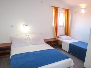 Katil atau katil-katil dalam bilik di Apartment Ivanka 2 by Interhome