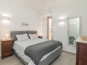 Ένα ή περισσότερα κρεβάτια σε δωμάτιο στο Apartment Pavoncella by Interhome