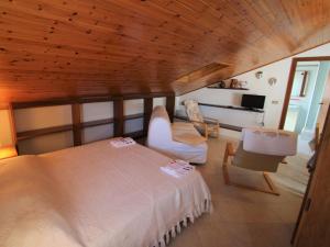 Posteľ alebo postele v izbe v ubytovaní Apartment Brunetta by Interhome