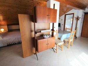Posteľ alebo postele v izbe v ubytovaní Apartment Brunetta by Interhome