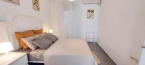 Posteľ alebo postele v izbe v ubytovaní Apartamento MURILLO-PLAZA DE LA MAGDALENA