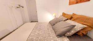 Posteľ alebo postele v izbe v ubytovaní Apartamento MURILLO-PLAZA DE LA MAGDALENA