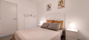 Posteľ alebo postele v izbe v ubytovaní Apartamento MURILLO-PLAZA DE LA MAGDALENA