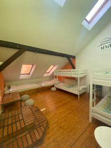 Postel nebo postele na pokoji v ubytování Unity Hostel Budapest