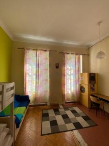 Kama o mga kama sa kuwarto sa Unity Hostel Budapest