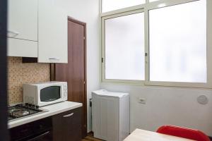 Kuchyňa alebo kuchynka v ubytovaní Santa Restituta in Cagliari Centre Q4825