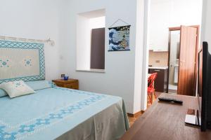 Posteľ alebo postele v izbe v ubytovaní Santa Restituta in Cagliari Centre Q4825