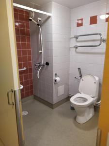 A bathroom at West Side Hotel