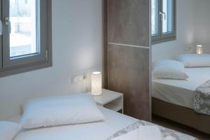Postel nebo postele na pokoji v ubytování Sand house Antiparos