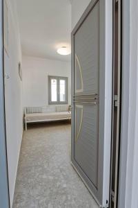 Postel nebo postele na pokoji v ubytování Sand house Antiparos