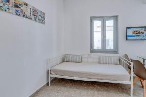 Postel nebo postele na pokoji v ubytování Sand house Antiparos