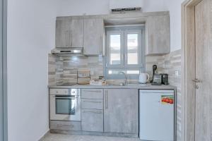 Kuchyň nebo kuchyňský kout v ubytování Sand house Antiparos