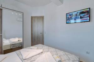 Postel nebo postele na pokoji v ubytování Sand house Antiparos