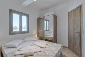 Postel nebo postele na pokoji v ubytování Sand house Antiparos