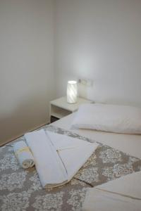 Postel nebo postele na pokoji v ubytování Sand house Antiparos