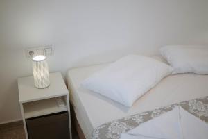 Postel nebo postele na pokoji v ubytování Sand house Antiparos