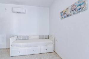 Postel nebo postele na pokoji v ubytování Sand house Antiparos