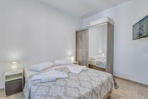 Postel nebo postele na pokoji v ubytování Sand house Antiparos