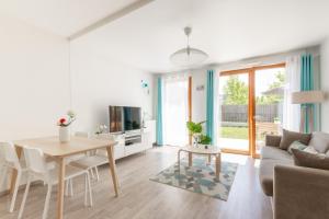 Televisyen dan/atau pusat hiburan di Sunny Garden by Plaza - Proche Disneyland Paris