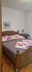 Posteľ alebo postele v izbe v ubytovaní Apartments Anđa near Queen Beach + 23 fotografií