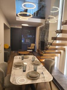 Posedenie v ubytovaní Adell Miramare Golden Loft