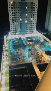 a view of a pool with a water park at Salinas exclusive Ary Costa in Salinópolis +3 photos