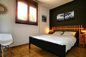 Posteľ alebo postele v izbe v ubytovaní CASA di u cuginu