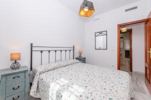 Posteľ alebo postele v izbe v ubytovaní Casa Melqart