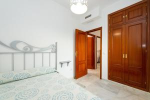 Posteľ alebo postele v izbe v ubytovaní Casa Melqart