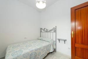 Posteľ alebo postele v izbe v ubytovaní Casa Melqart