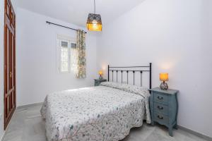 Posteľ alebo postele v izbe v ubytovaní Casa Melqart
