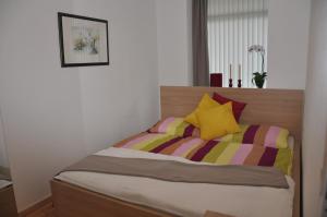 מיטה או מיטות בחדר ב-Appartement Romantikstadt Steyr